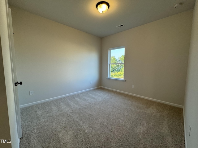 empty room featuring carpet floors