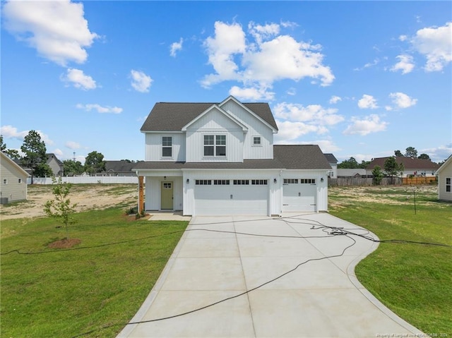 view of front facade featuring a garage and a front yard