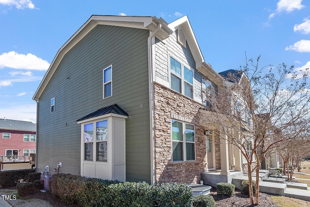 1001 Drayman Pl, Apex, NC 27502 - view of side of property with stone siding