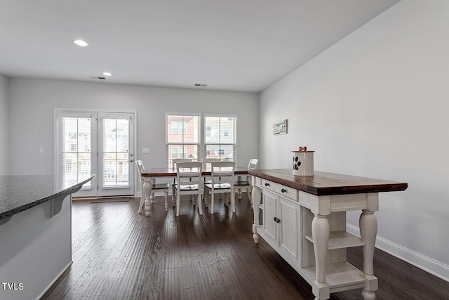 1001 Drayman Pl, Apex, NC 27502 - dining area featuring dark wood-style flooring, recessed lighting, and baseboards