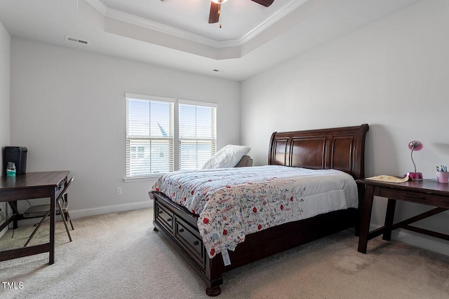 1001 Drayman Pl, Apex, NC 27502 - bedroom with light carpet, a raised ceiling, crown molding, baseboards, and ceiling fan