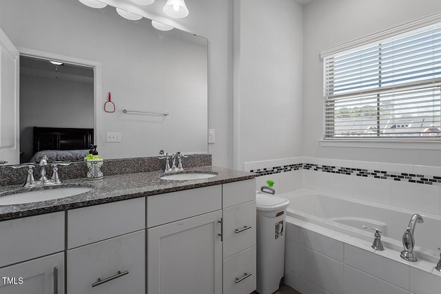 1001 Drayman Pl, Apex, NC 27502 - bathroom with double vanity, a bath, and ensuite bath