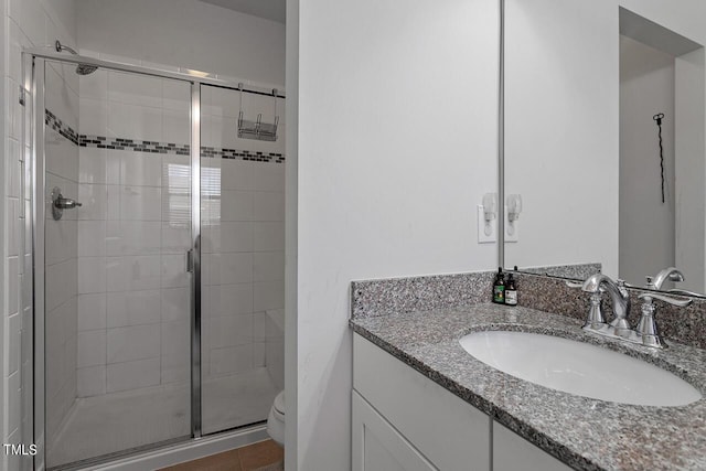 1001 Drayman Pl, Apex, NC 27502 - bathroom featuring vanity, a stall shower, and toilet