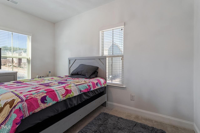 1001 Drayman Pl, Apex, NC 27502 - carpeted bedroom with baseboards