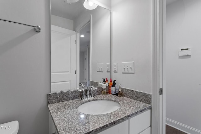 1001 Drayman Pl, Apex, NC 27502 - half bathroom with vanity and toilet