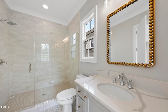 bathroom featuring walk in shower, vanity, and toilet