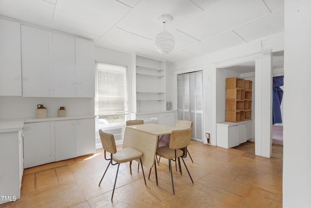 dining area featuring built in features