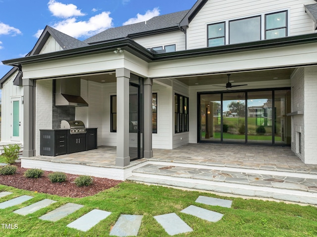 entrance to property with a patio and ceiling fan