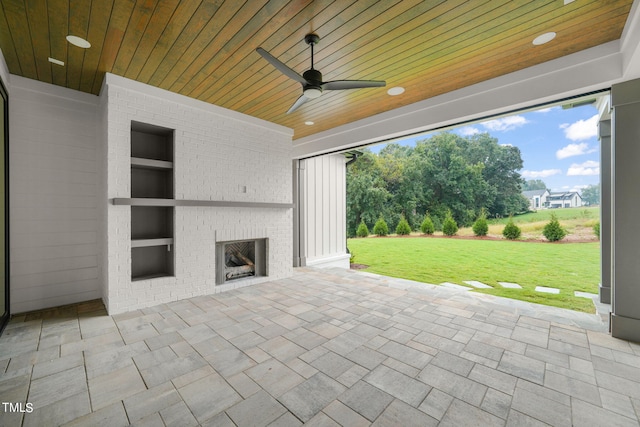 view of patio featuring ceiling fan