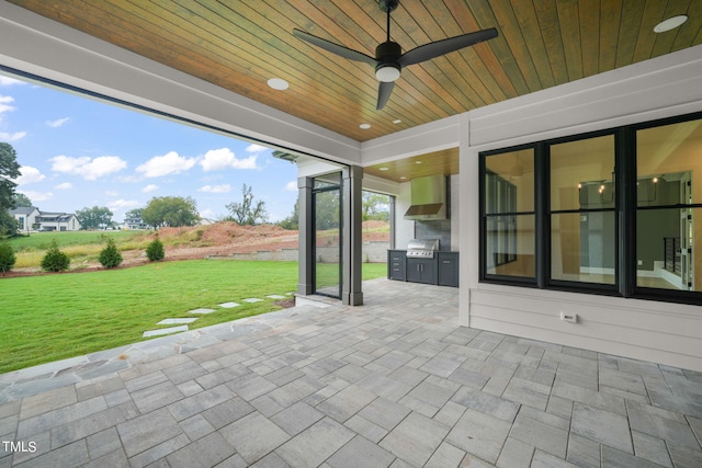 view of patio / terrace featuring grilling area, area for grilling, and ceiling fan