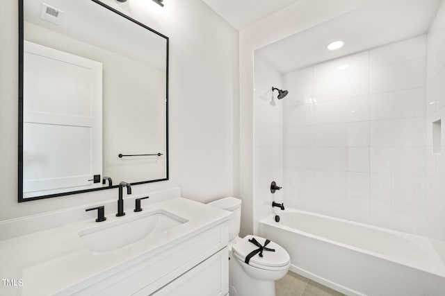 full bathroom with vanity, toilet, tile patterned floors, and tiled shower / bath