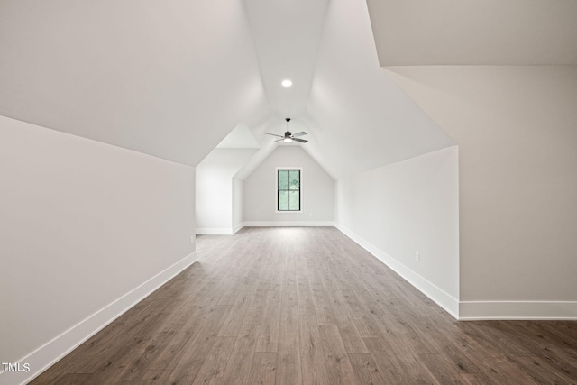 additional living space featuring lofted ceiling, ceiling fan, and hardwood / wood-style floors