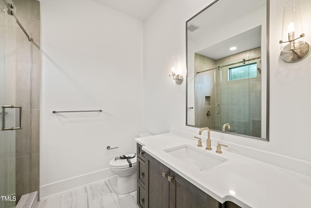 bathroom with walk in shower, vanity, and toilet