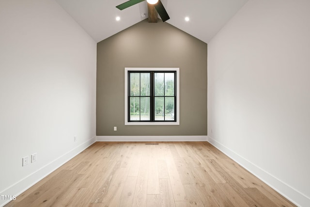 unfurnished room featuring high vaulted ceiling, light wood-type flooring, ceiling fan, and beamed ceiling