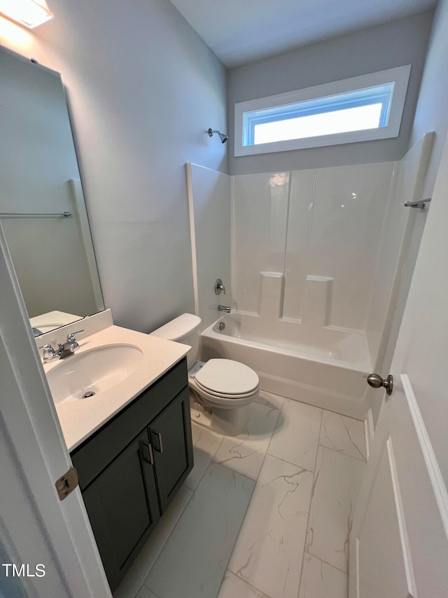 full bathroom with shower / tub combination, vanity, and toilet