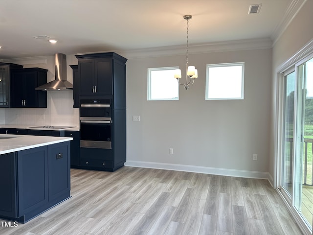 kitchen with backsplash, multiple ovens, black electric stovetop, ornamental molding, and wall chimney exhaust hood