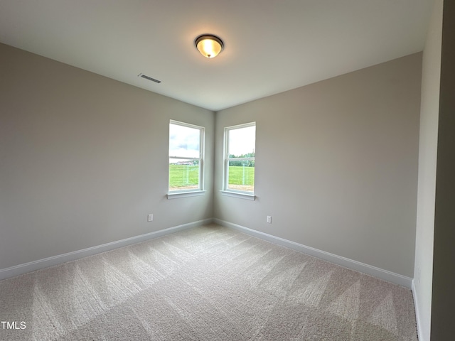 empty room with light carpet