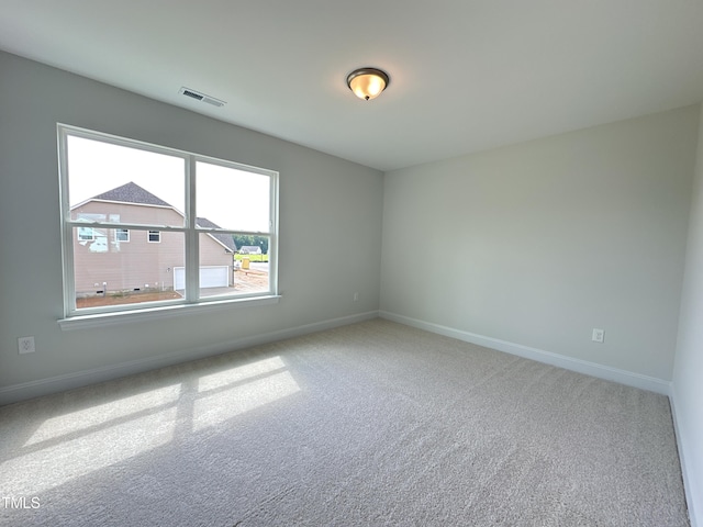 view of carpeted spare room