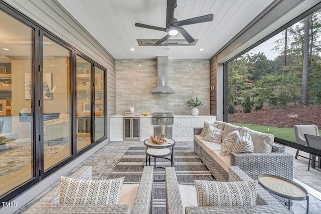 1312 Hunting Ridge Rd, Raleigh, NC 27615 - sunroom / solarium featuring plenty of natural light, an outdoor hangout area, a ceiling fan, and an outdoor kitchen