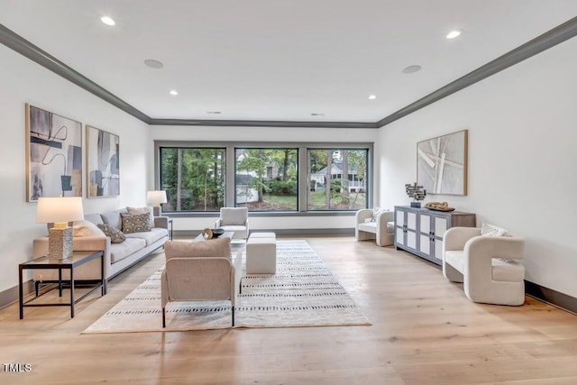 1312 Hunting Ridge Rd, Raleigh, NC 27615 - living room with ornamental molding, wood finished floors, baseboards, and recessed lighting