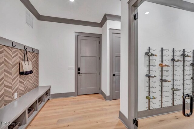 1312 Hunting Ridge Rd, Raleigh, NC 27615 - mudroom with light wood-type flooring, baseboards, and recessed lighting