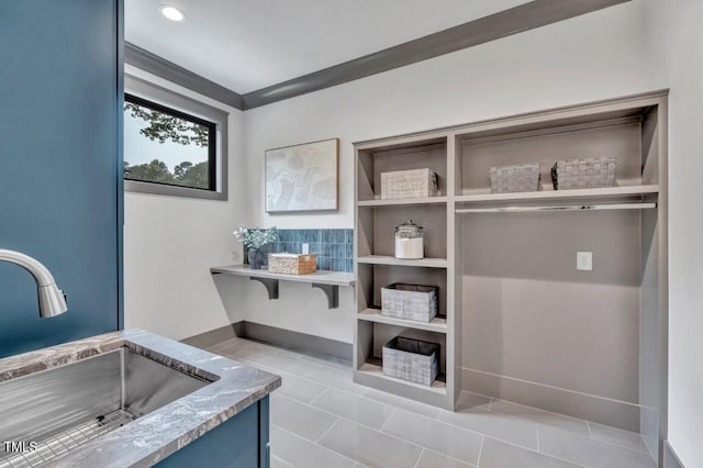 1312 Hunting Ridge Rd, Raleigh, NC 27615 - bathroom with a sink, tile patterned flooring, and recessed lighting