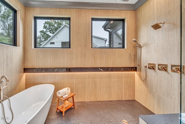 1312 Hunting Ridge Rd, Raleigh, NC 27615 - bathroom with a freestanding tub, healthy amount of natural light, and a sink