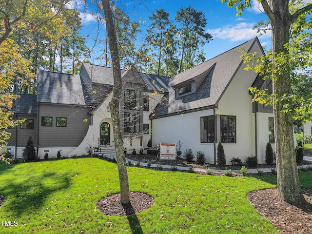 1312 Hunting Ridge Rd, Raleigh, NC 27615 - view of front of property with entry steps, a front yard, and stucco siding