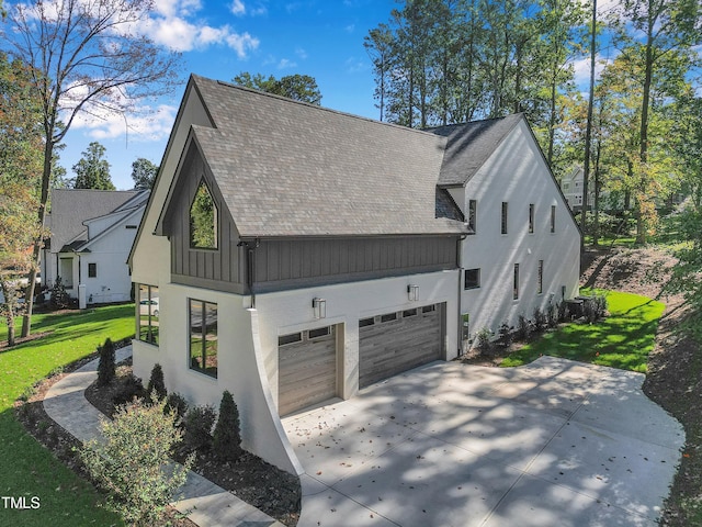 1312 Hunting Ridge Rd, Raleigh, NC 27615 - view of front of house featuring roof with shingles, a front lawn, driveway, and a garage