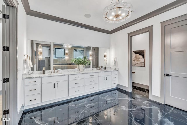 1312 Hunting Ridge Rd, Raleigh, NC 27615 - full bathroom with a chandelier, marble tiled floors, double vanity, crown molding, and baseboards