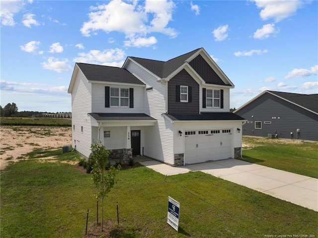 craftsman-style home with central AC, a garage, and a front lawn