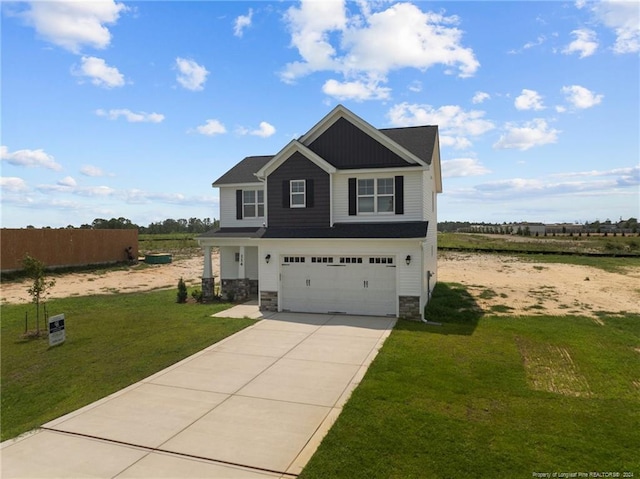 craftsman-style home with a garage and a front yard