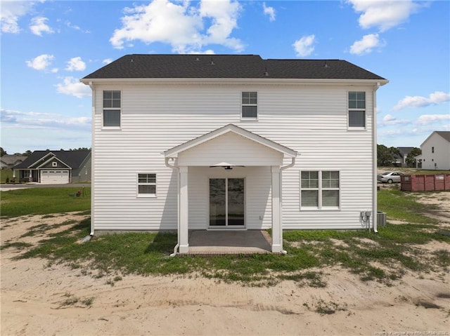 back of property featuring central AC unit and a patio