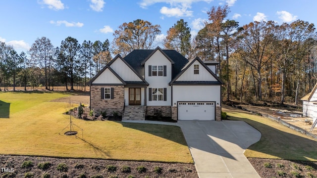 view of front facade featuring a garage and a front yard