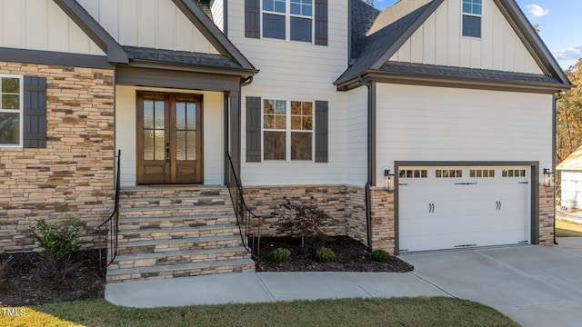 property entrance with french doors and a garage