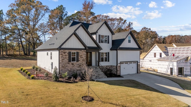 148 Hook Dr Lot 7, Fuquay Varina, NC 27526 - view of front facade featuring concrete driveway, board and batten siding, a front lawn, and an attached garage