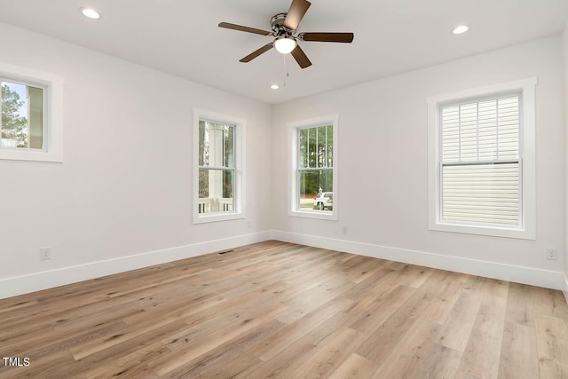 unfurnished room with light hardwood / wood-style floors and ceiling fan