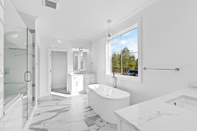 bathroom with a wealth of natural light, vanity, crown molding, and independent shower and bath