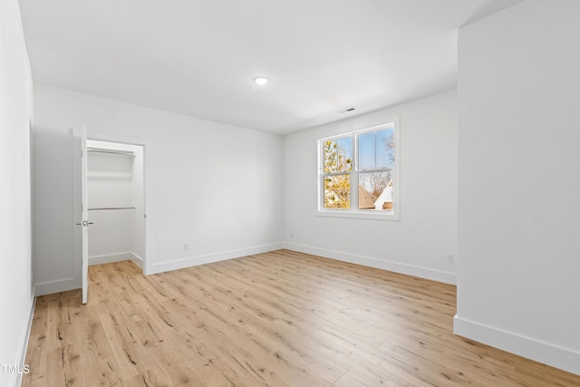 unfurnished bedroom with light hardwood / wood-style floors