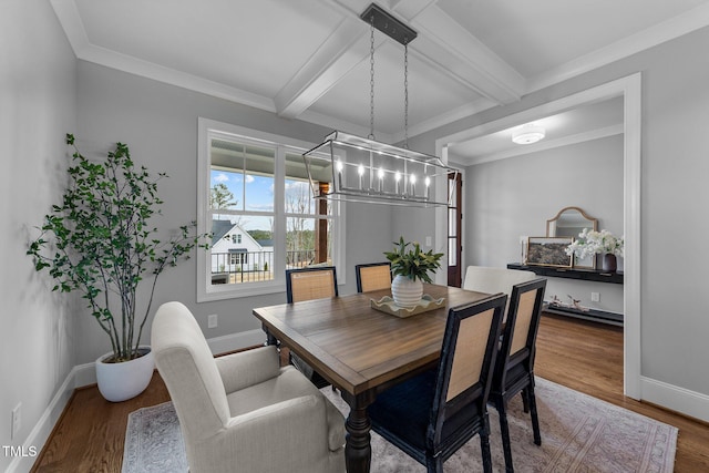 262 Hook Dr Lot 12, Fuquay Varina, NC 27526 - dining area featuring a chandelier, wood finished floors, beamed ceiling, baseboards, and coffered ceiling