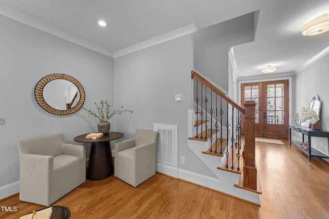 262 Hook Dr Lot 12, Fuquay Varina, NC 27526 - entryway with ornamental molding, wood finished floors, stairway, baseboards, and recessed lighting
