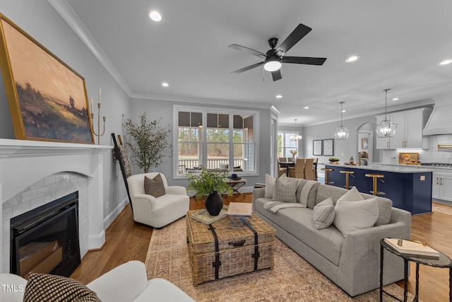 262 Hook Dr Lot 12, Fuquay Varina, NC 27526 - living room with recessed lighting, crown molding, a ceiling fan, wood finished floors, and baseboards