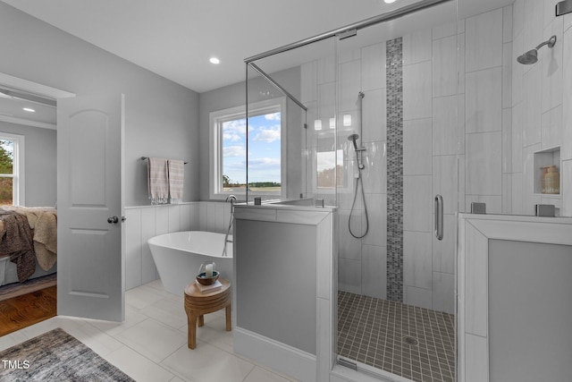 262 Hook Dr Lot 12, Fuquay Varina, NC 27526 - ensuite bathroom with a stall shower, a freestanding tub, recessed lighting, and tile patterned flooring
