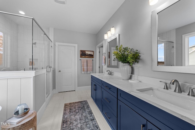 262 Hook Dr Lot 12, Fuquay Varina, NC 27526 - bathroom featuring a stall shower, double vanity, and baseboards