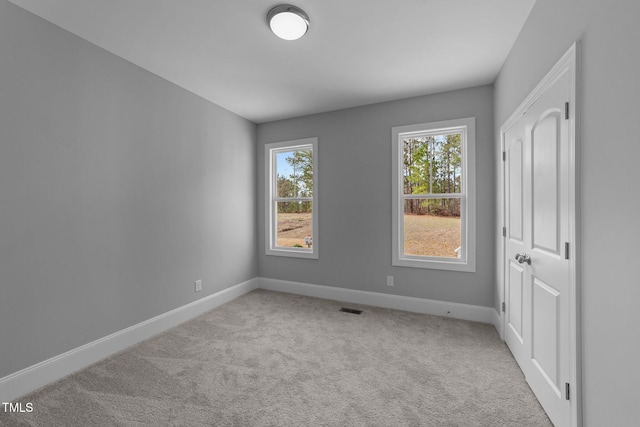 262 Hook Dr Lot 12, Fuquay Varina, NC 27526 - unfurnished bedroom with baseboards and carpet