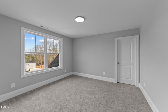 262 Hook Dr Lot 12, Fuquay Varina, NC 27526 - carpeted spare room featuring baseboards