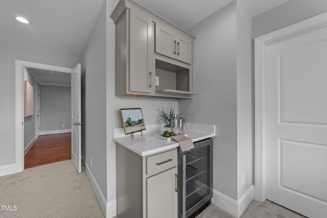 262 Hook Dr Lot 12, Fuquay Varina, NC 27526 - indoor bar with wine cooler, light colored carpet, baseboards, and recessed lighting