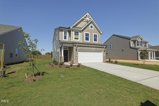 craftsman-style home featuring a front yard and a garage