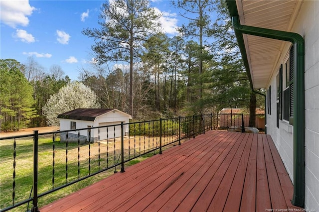 5027 Lake Willett Rd, Sanford, NC 27332 - deck with a lawn, an outbuilding, and a detached garage