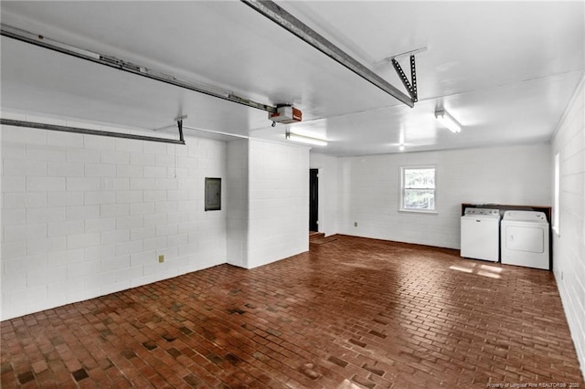 5027 Lake Willett Rd, Sanford, NC 27332 - garage with electric panel, concrete block wall, independent washer and dryer, and a garage door opener